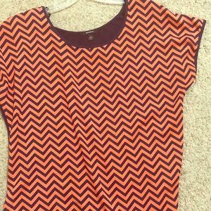 Coral and navy blue striped blouse